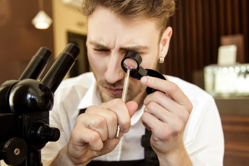 Jeweler Examines a Gem